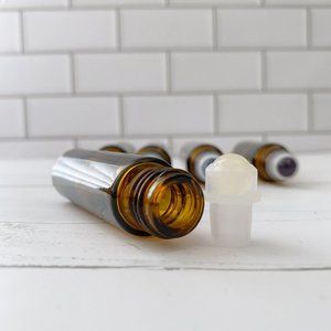 10 count 10ml empty amber essential oil bottles w/ topaz roller balls.